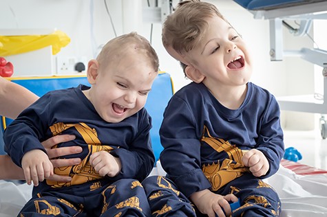 Twins post-separation. Twins post-separation taking part in physiotherapy.